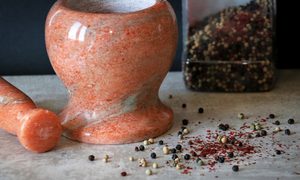 best spice grinders close up of peppercorns