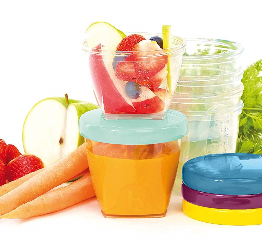stacking plastic containers with baby food