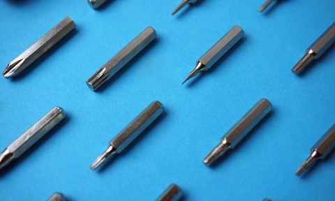 the best apothecary jars made of glass high angle view drill bits arranged on blue background