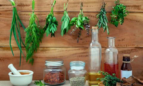 Herbs drying above shelf