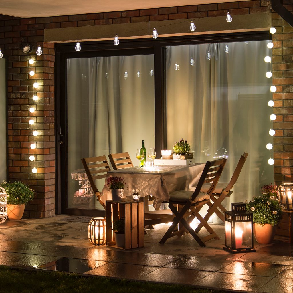 small patio with string lights