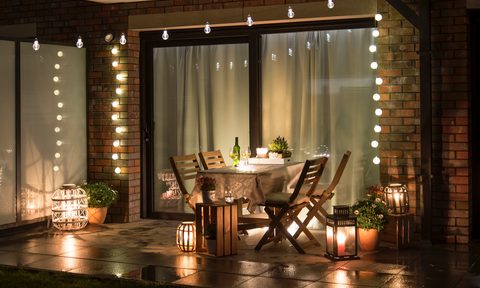 small patio with string lights