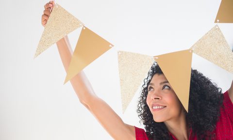 the best paint can openers to open your gallon of easily mixed race woman hanging celebration banner
