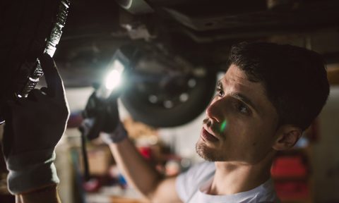 best tool trays for organizer and magnetic mechanic checking the underbody of a car in workshop