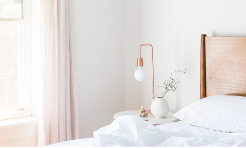 brass lamp on bedside table