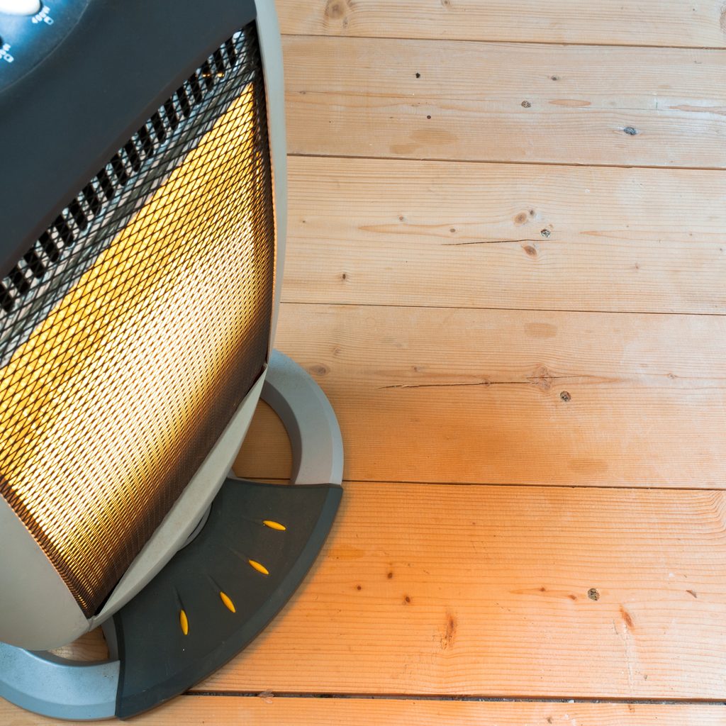 Ceramic heater on wood floor