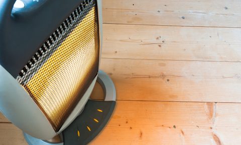 Ceramic heater on wood floor