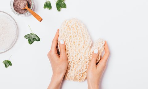 the best exfoliating gloves for your face and body woman s hands holding natural massage mitten washcloth