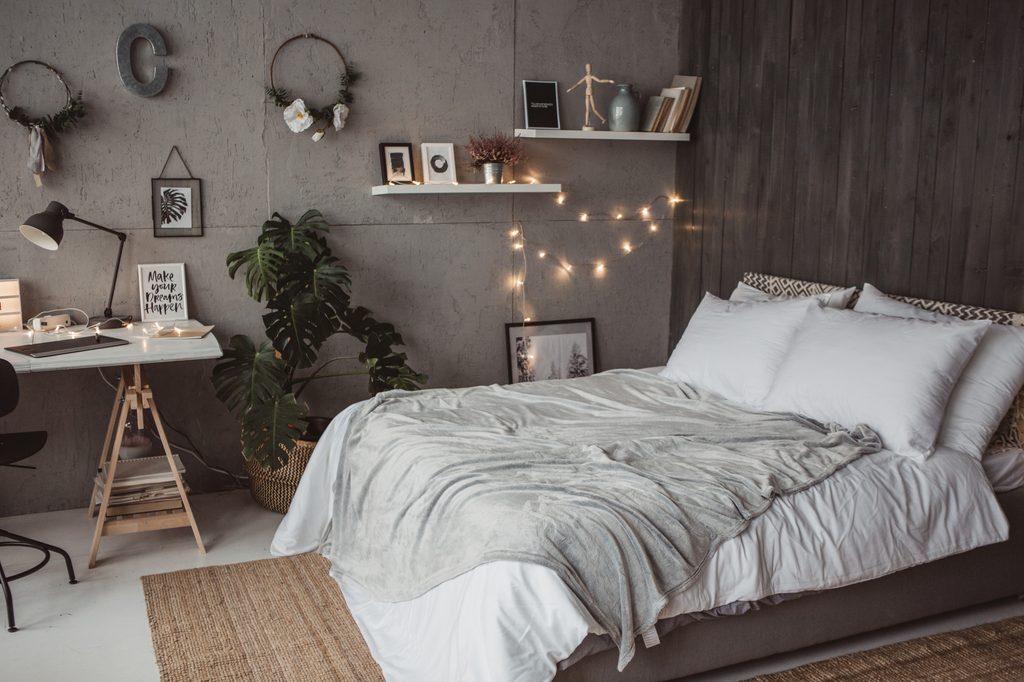 gray bedroom with fairy lights