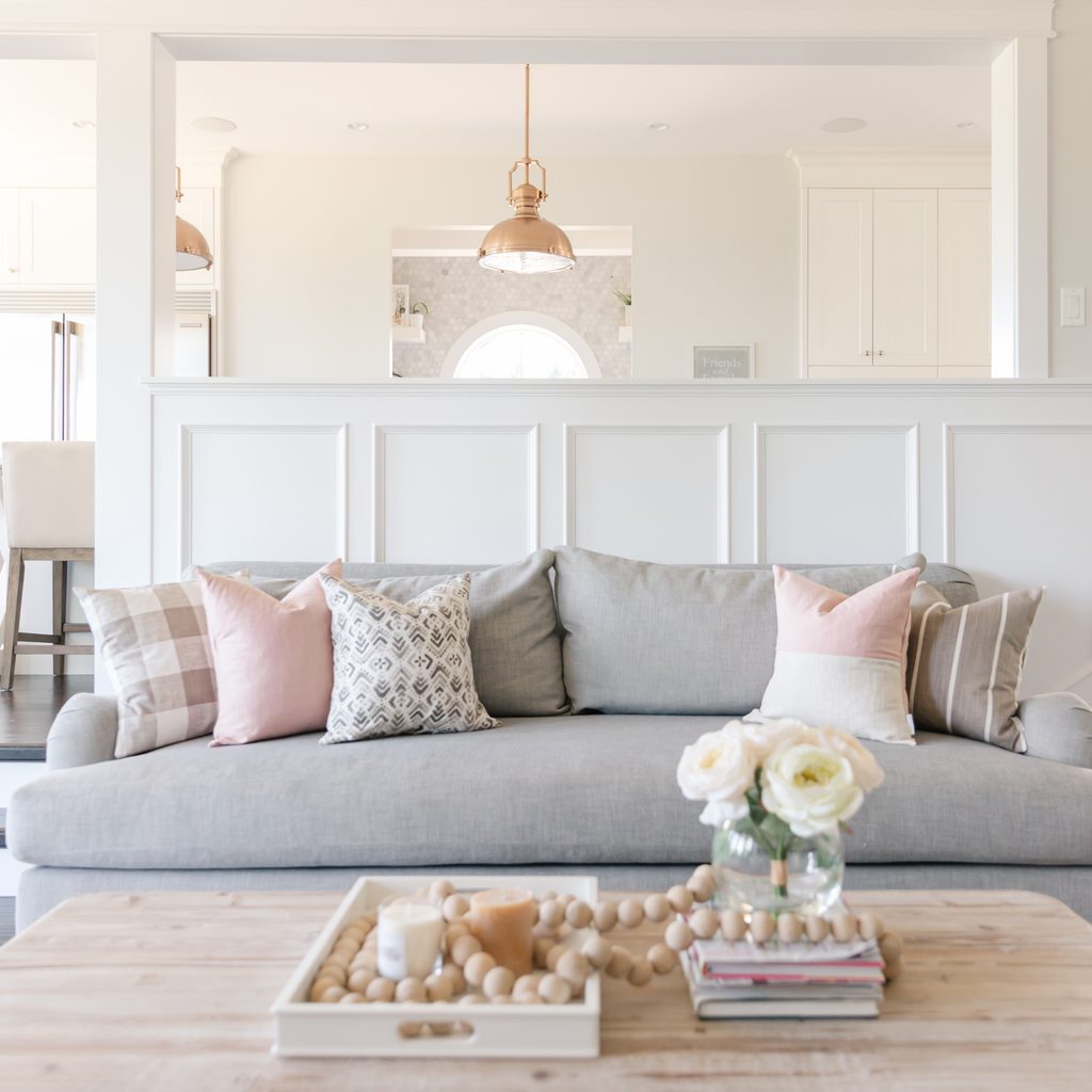 interior white sitting room and kitchen