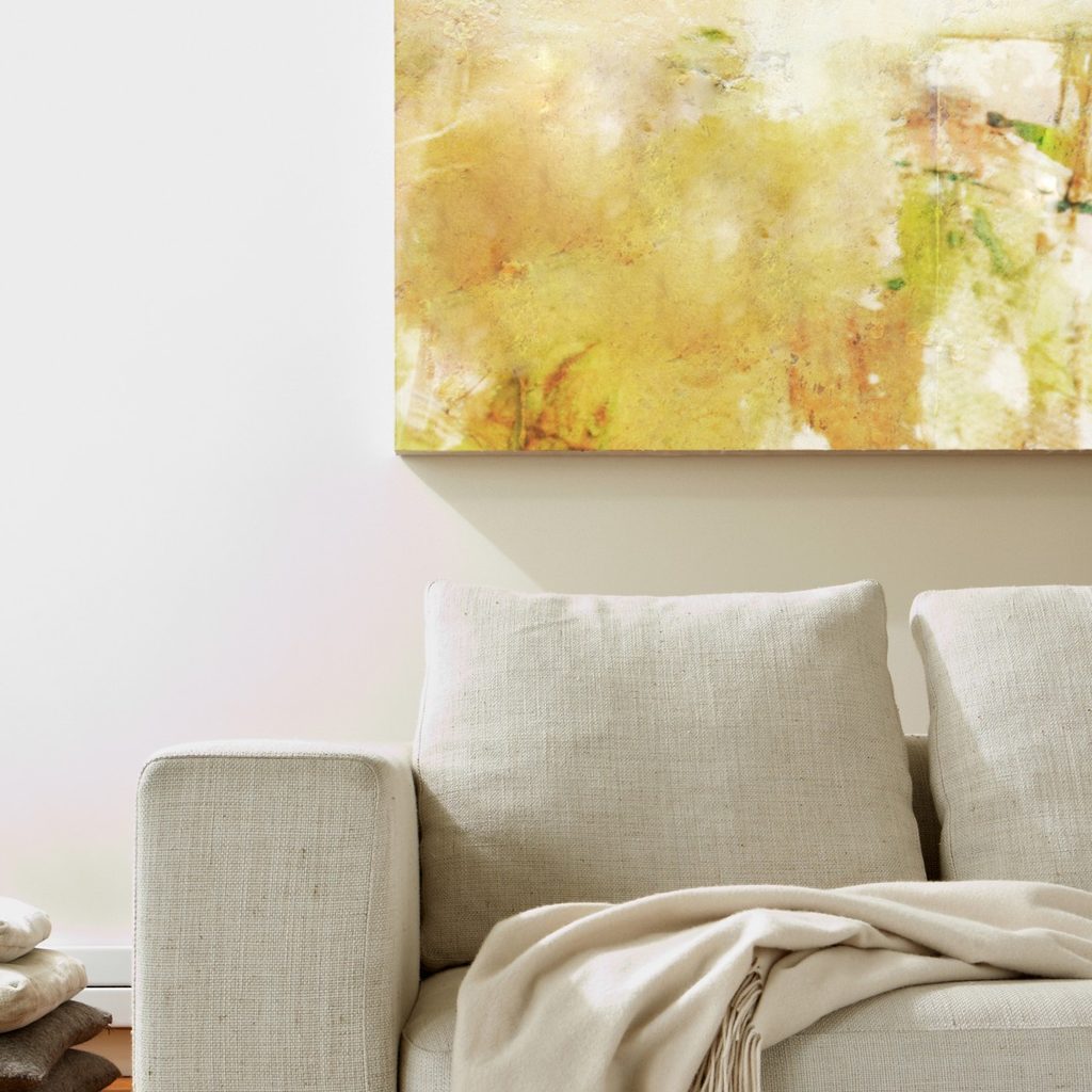 Living room with couch and artwork on the wall