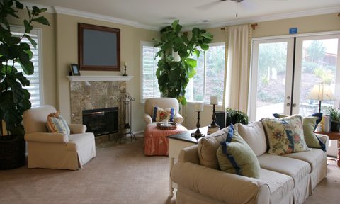 Living room with furniture and crown molding