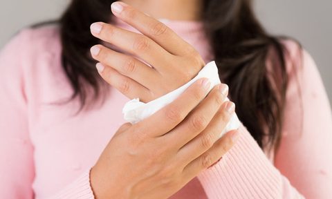 best hand wipes sanitizer disinfectant germ prevention woman cleaning her hands with a tissue healthcare and medical concept 