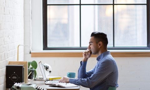 man in home office