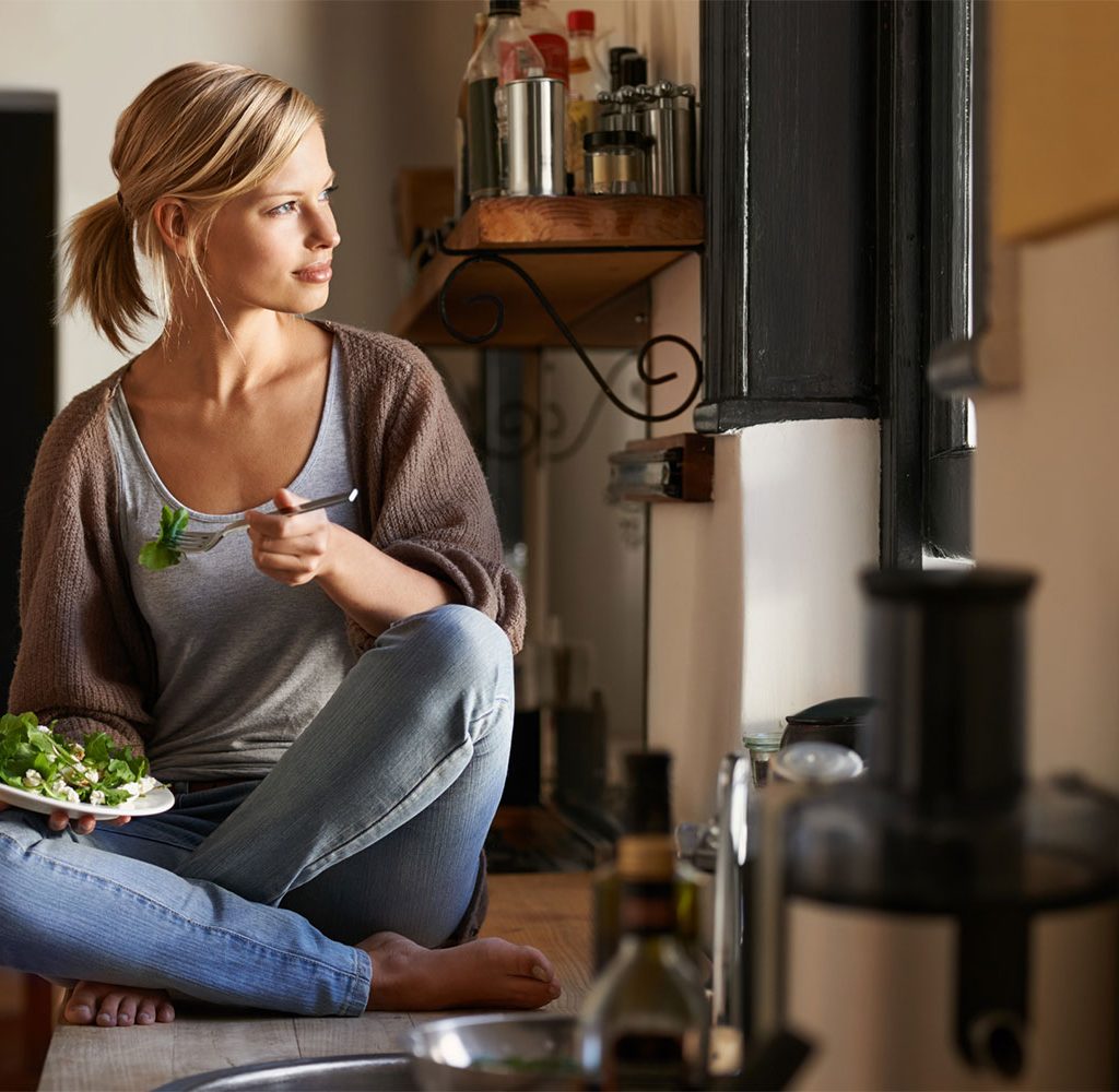 woman in rustic kitchen