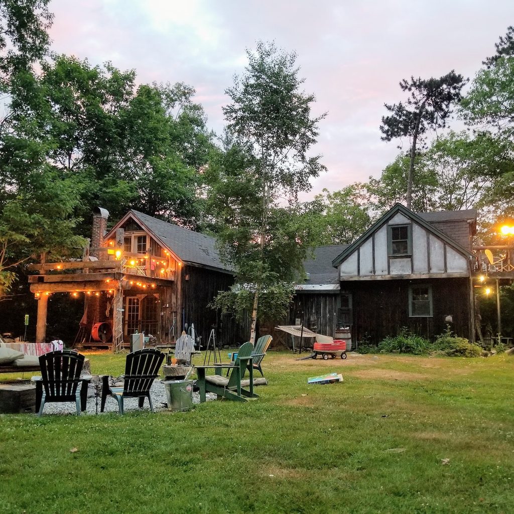 large yard with lights and seating area