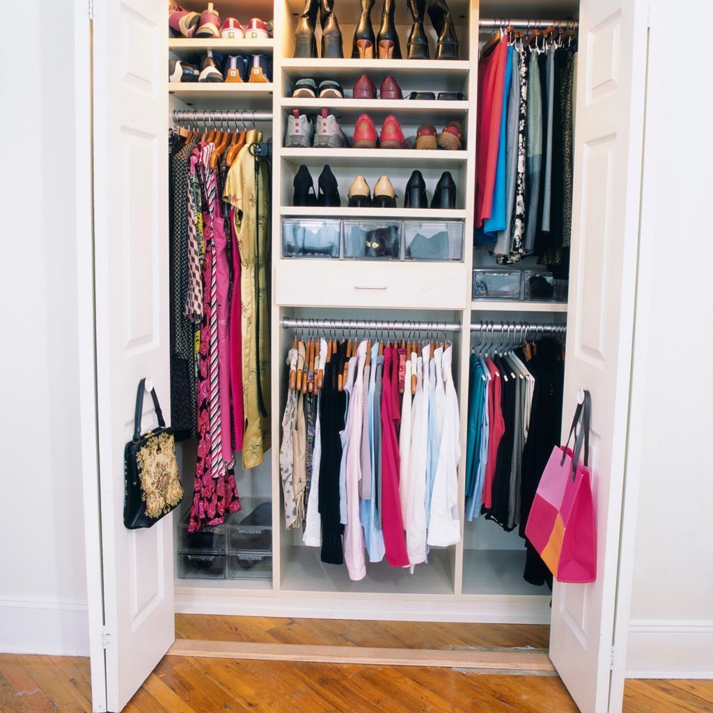 Organized closet with hanging clothes