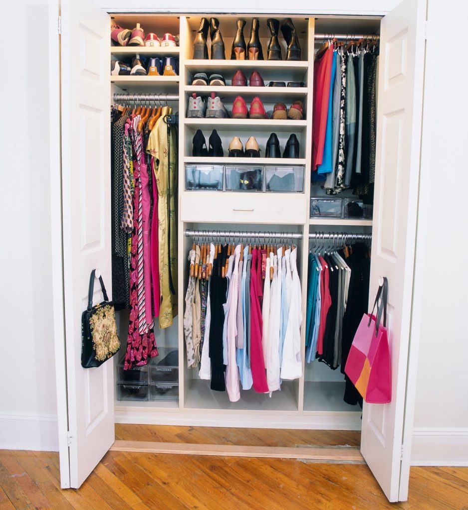 Organized closet with hanging clothes
