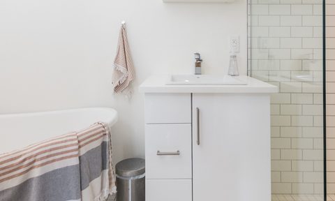 Bathroom with tub and sink