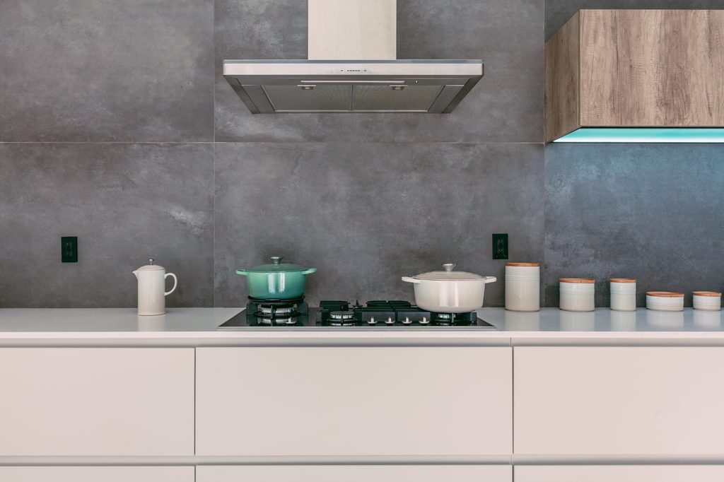 Kitchen with stove and vent
