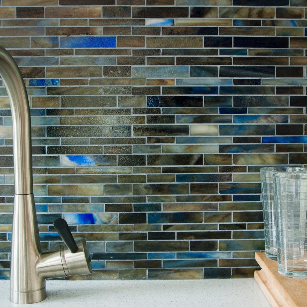 Kitchen counter with sink and glasses
