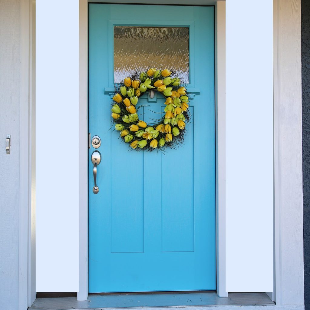 Blue door with yellow wreath
