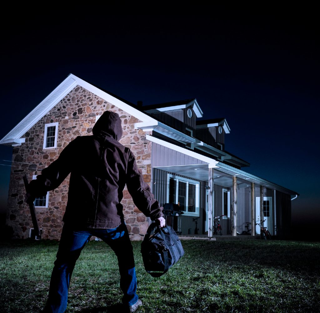 burglar outside of house at night