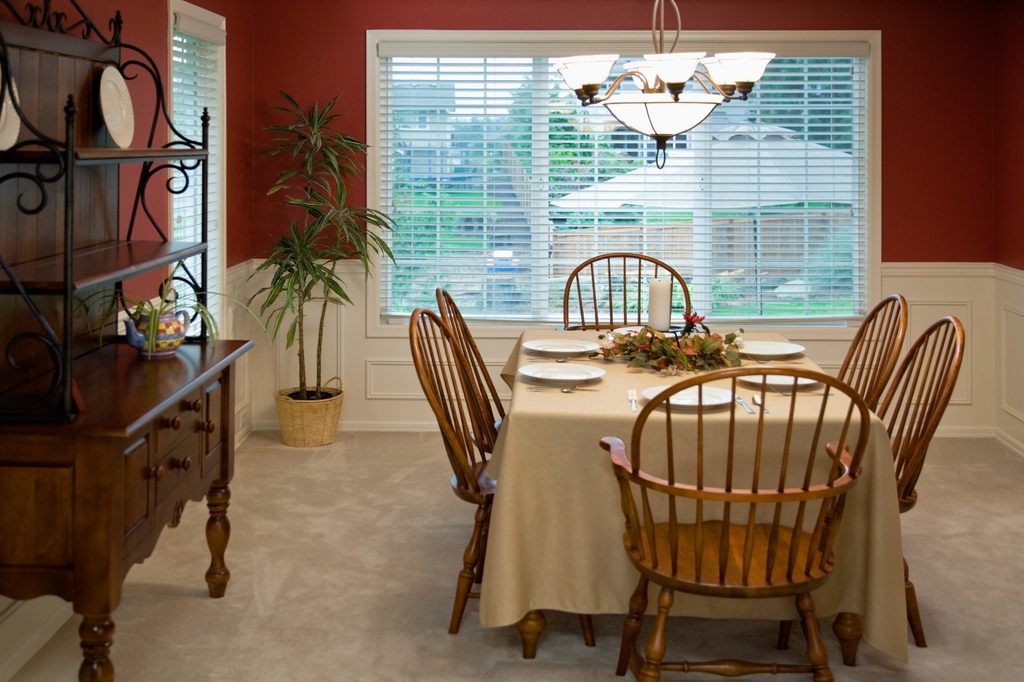 Dining room with red walls and table