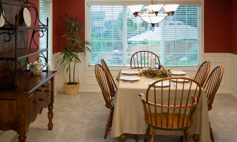 Dining room with red walls and table