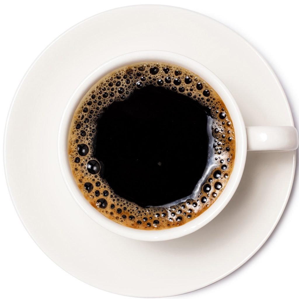 Cup of coffee on serving plate