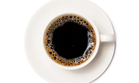 Cup of coffee with serving plate