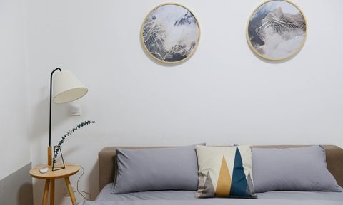 bed with tiny bedside table