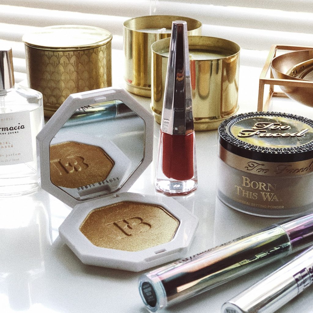 Array of makeup items on bathroom counter