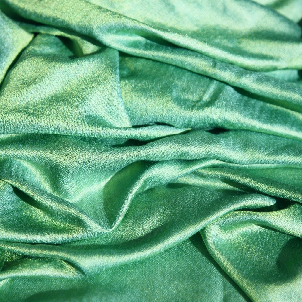 large piece of green silk fabric