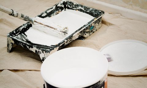 A paint holder with roller and can