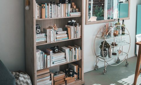 Bookshelf filled with books and decorations
