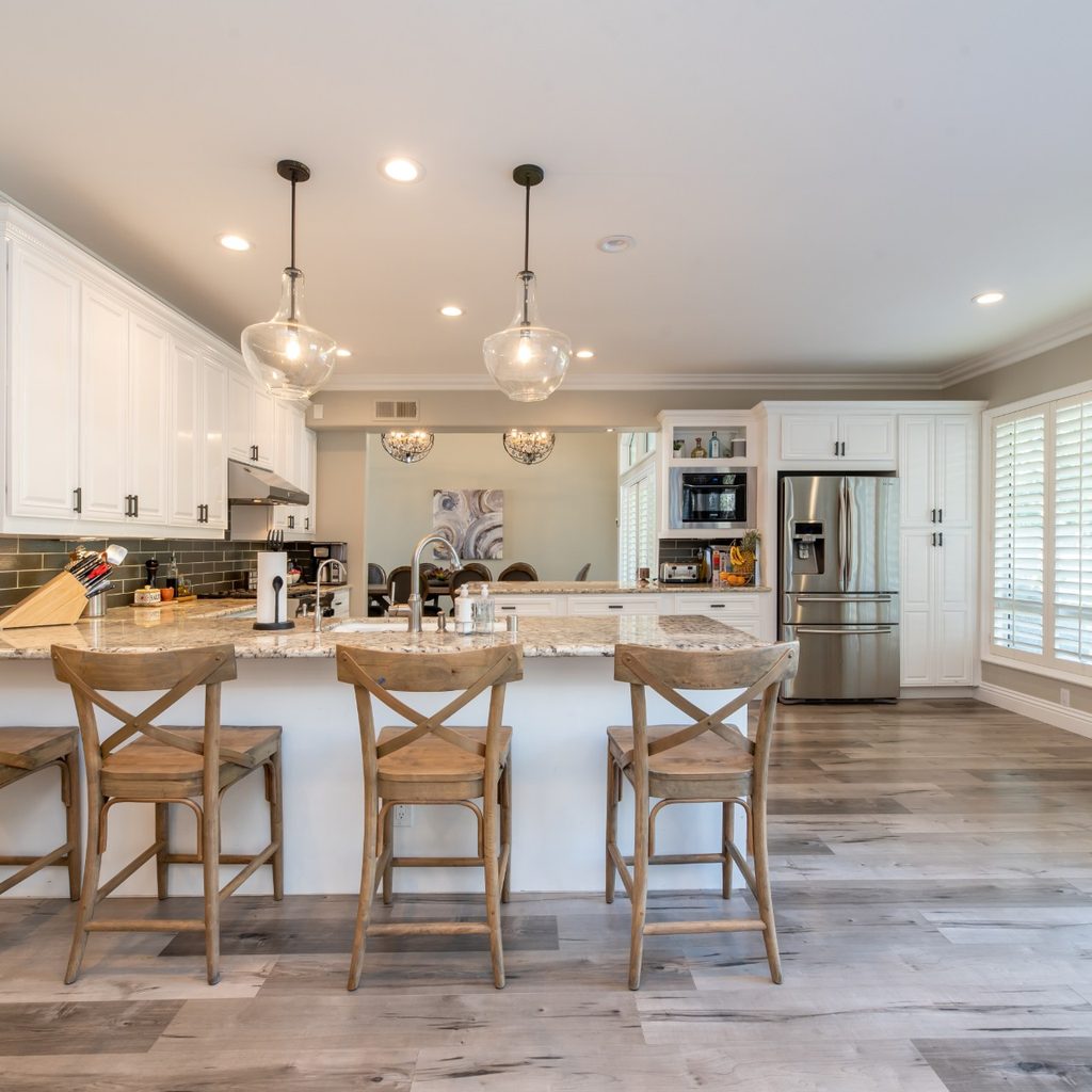 Kitchen island with wooden chairs