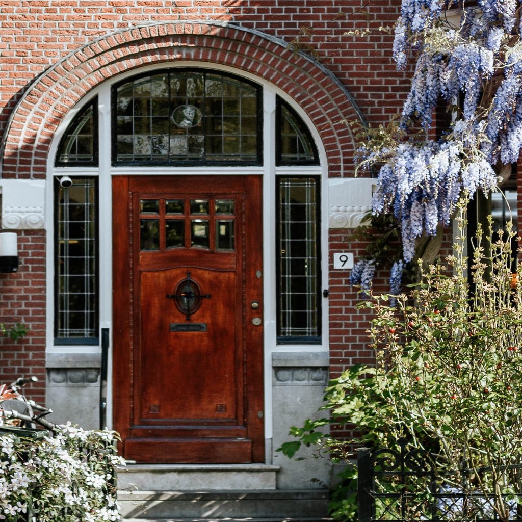 Front door view. Exterior door types of finish for wood.