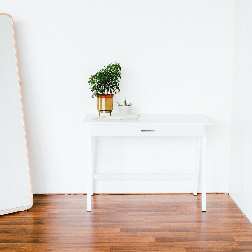 oversized full-length mirror in minimalist room