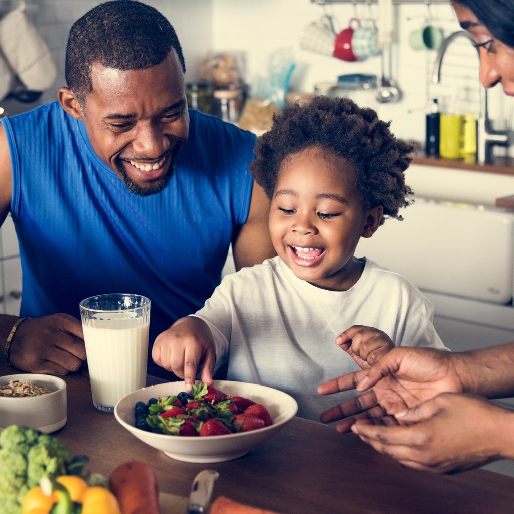 Happy family in eat-in kitchen