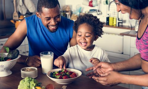 Happy family in eat-in kitchen