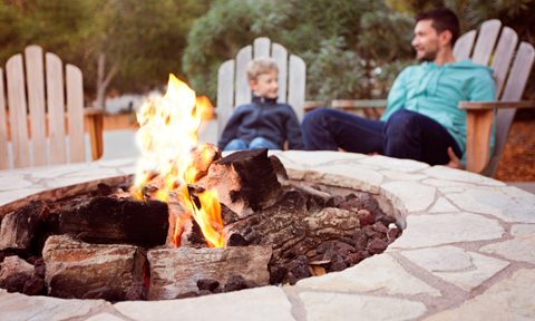Father and son outdoor firepit