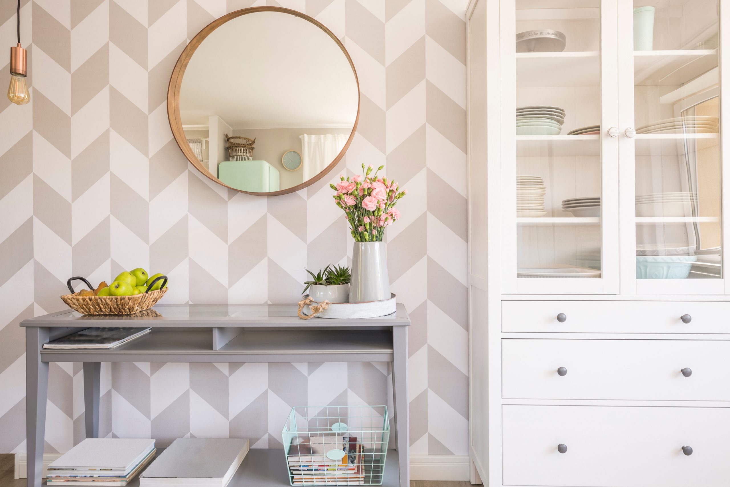 geometric wallpaper with console table