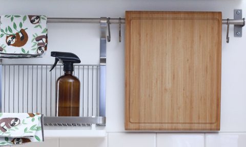 All-purpose cleaner in amber bottle in bathroom