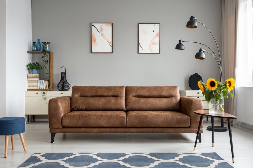 Brown leather midcentury modern couch
