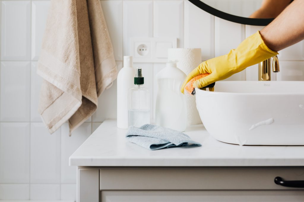 Cleaning tools and products on a counter