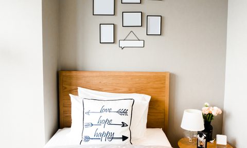 Bedroom wall with mirrors.
