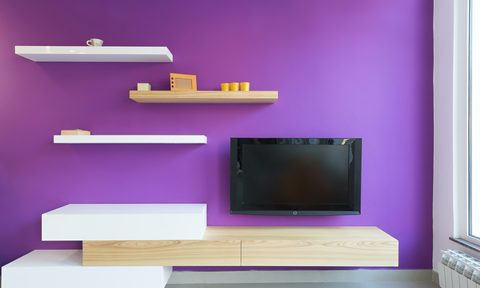 wall-mounted TV with shelves