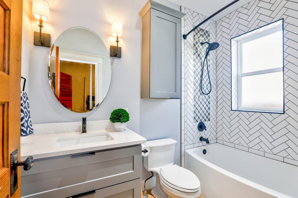 Bathroom with sconce lights
