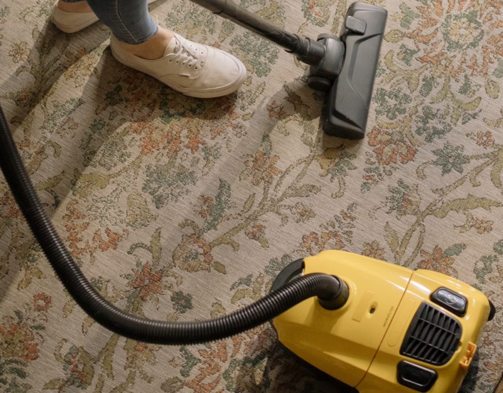 vacuuming floor